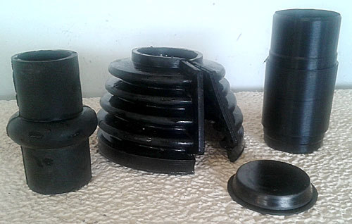 Tube-compensateur, protection contre la poussi&egrave;re, soufflet en caoutchouc